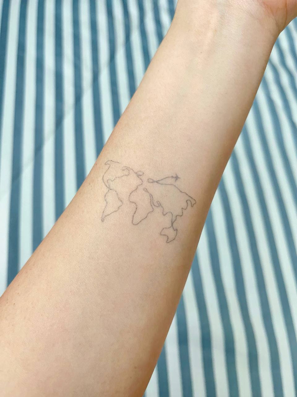 Some of the BEST travel tattoos ✈️ you can find! ⭕️ Do you like any of  them? Which one 1-9? ✨ - Keep an eye… | World map tattoos, Wrist bracelet  tattoo, Map tattoos